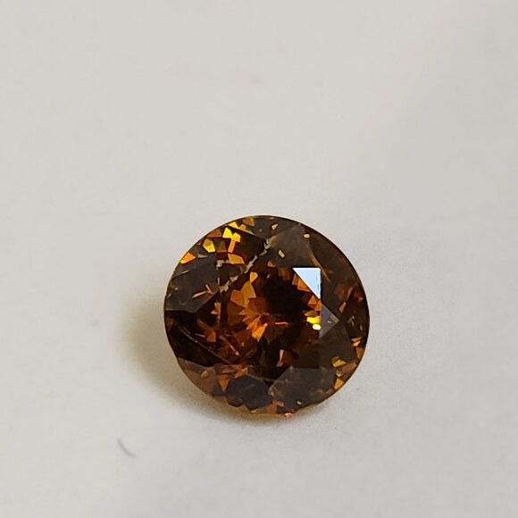 Sphene 7.18mm x 6.88mm x 4.30mm Oval 1.47ct Loose Gemstone - Picture 9 of 16